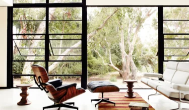 Eames lounge chair with mid century modern furniture